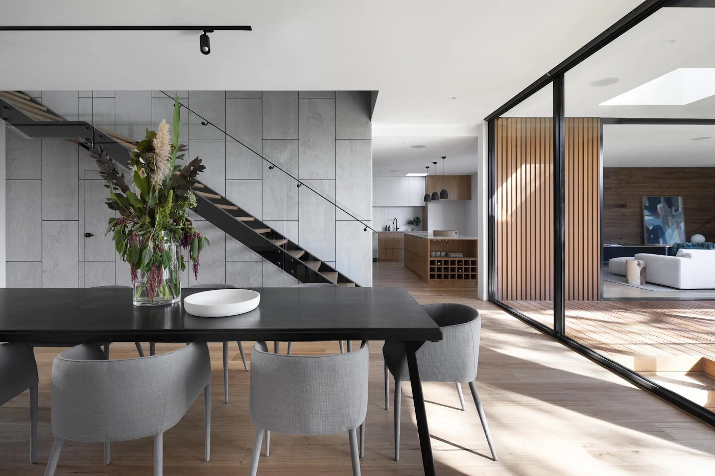 Modern dining area with natural wood and steel details — design inspiration